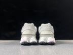 New Balance 9060 U9060ZGE Sneakers in White and Pink