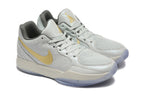 Nike Kyrie Low Basketball Shoes in Gray and Gold