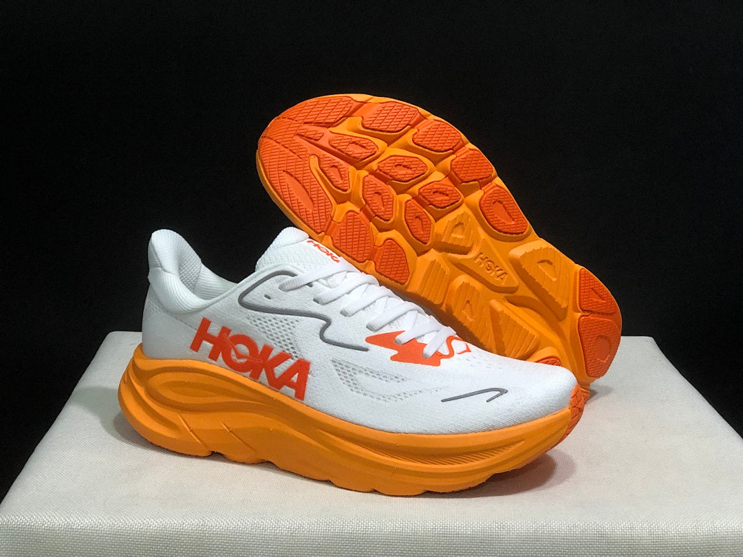 HOKA Clifton 10 Running Shoes in White and Orange
