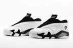 Jordan 14 Low Sneakers in White and Black