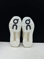 On The Roger Advantage Pro Sneakers in Cream and Black