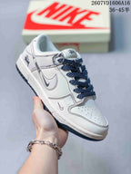Nike SB Dunk Low White Gray Monogram-Style Sneakers