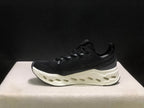 On Cloudsurfer Max Black and White Running Sneakers