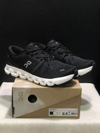 On Cloud X 4 Black and White Sneakers