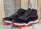 Jordan 11 Black and Red High-Top Sneakers