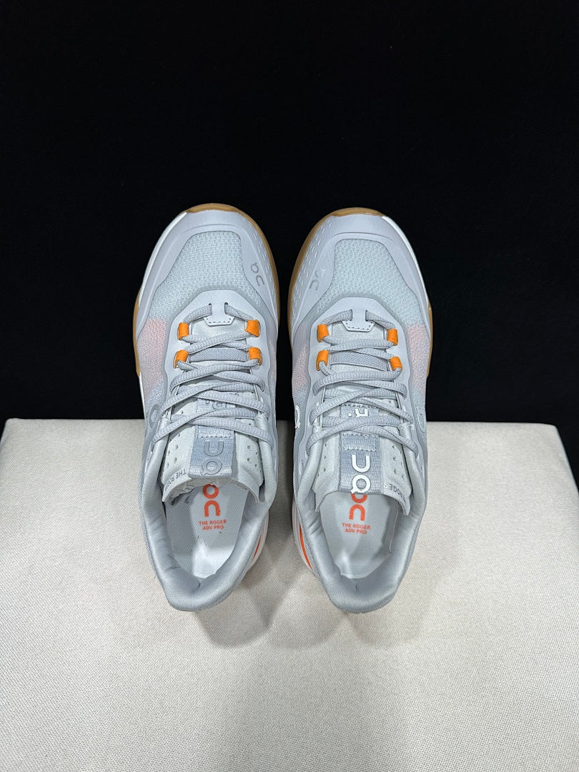 On THE ROGER Advantage Pro Tennis Shoes, Grey and Orange
