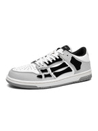 AMIRI Gray and White Low-Top Sneakers with Black Accents