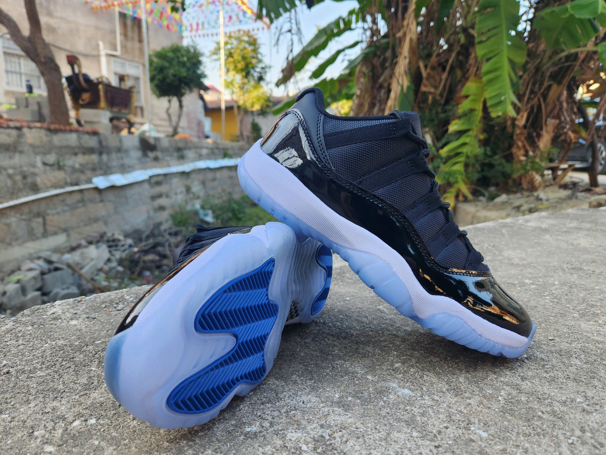 Air Jordan 11 Low Black and White Sneakers