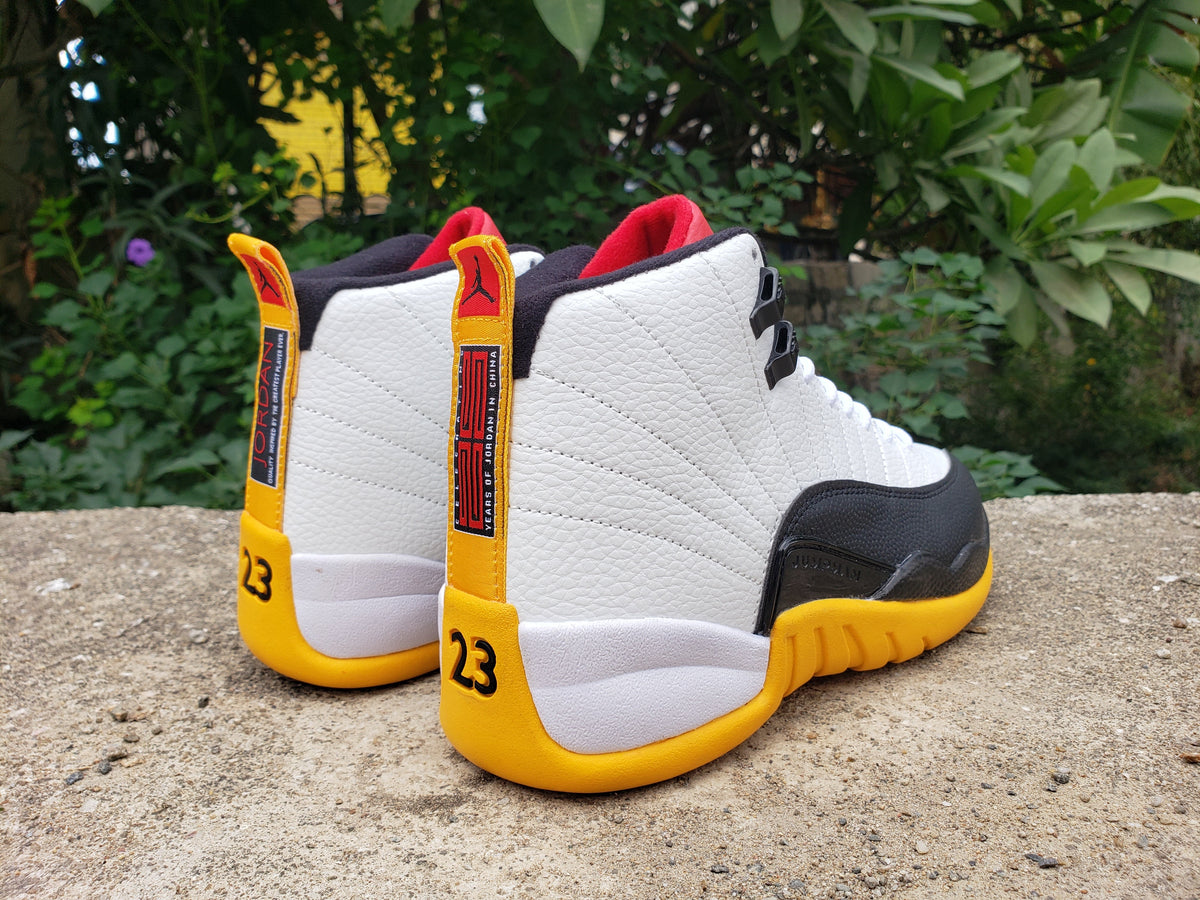 Air Jordan 12 White Black Yellow High-Top Sneakers