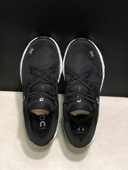 On Cloud X 4 Black and White Sneakers