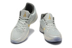 Nike Kyrie Low Basketball Shoes in Gray and Gold