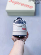Jordan 1 Low White and Navy Sneakers