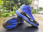 Jordan 11 Retro High Sneakers in Blue and Black