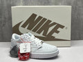 Jordan 1 Low White Sneaker with Swoosh Detail