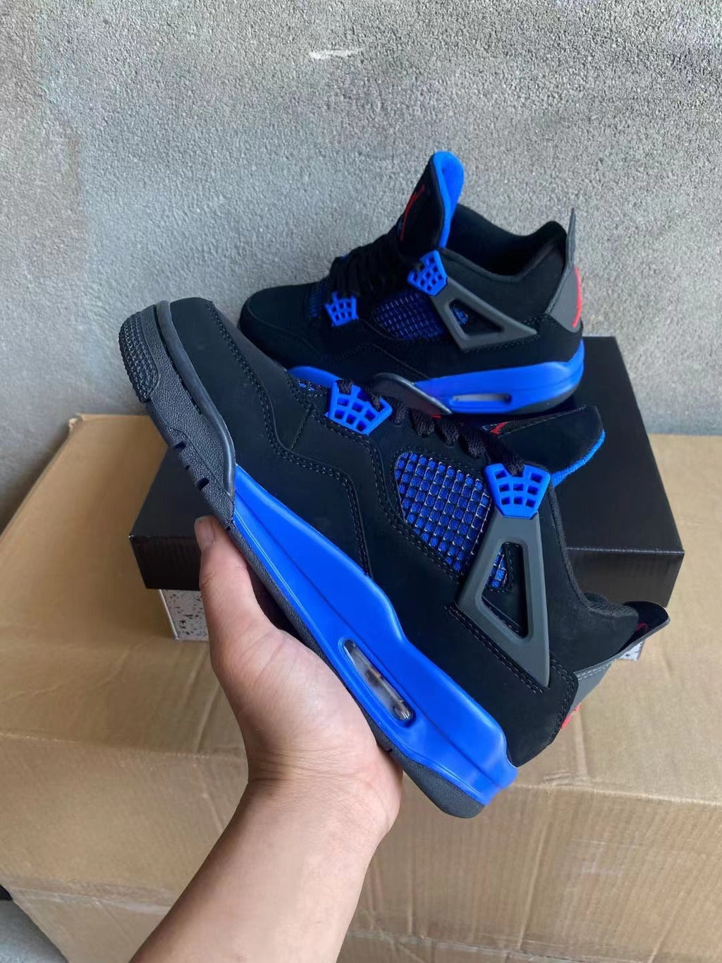 Air Jordan 4 Black and Blue High-Top Sneakers