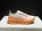 On Cloudsurfer Max Running Shoes in Pearl and Tangerine