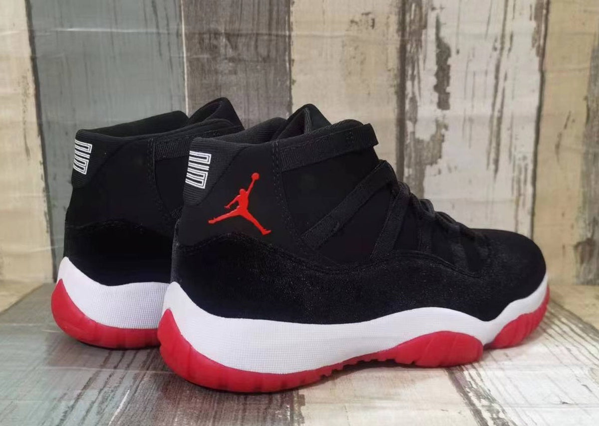 Jordan 11 Black and Red High-Top Sneakers