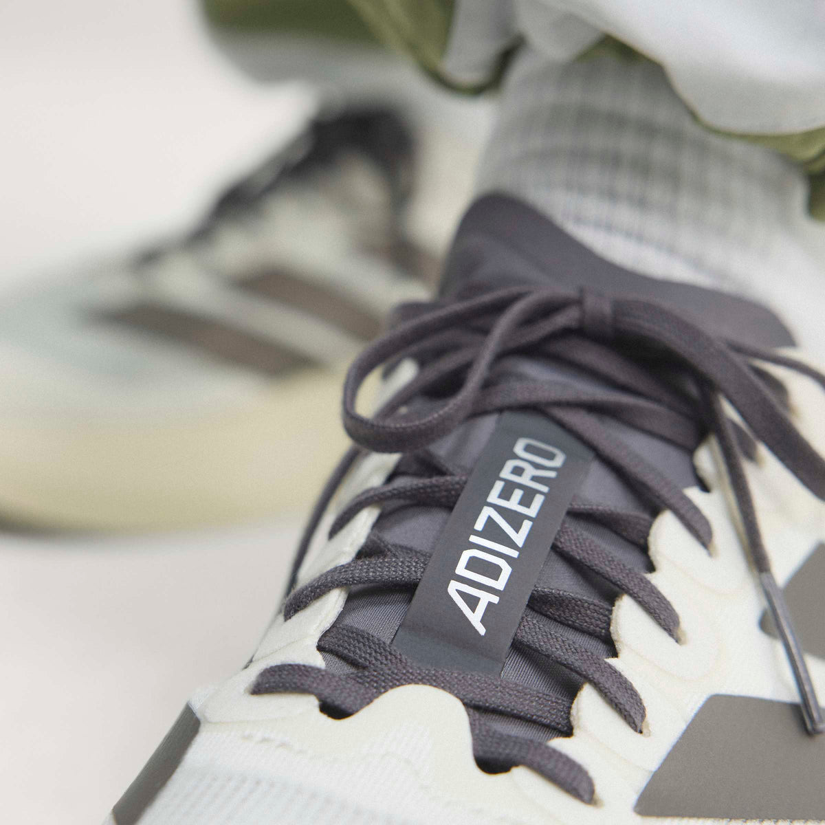 Adidas Adizero Evo SL Color: OWHITE/AUCOME Style: KI9873