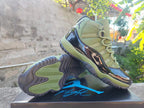 Jordan 11 Retro High Sneakers in Black and Olive Green