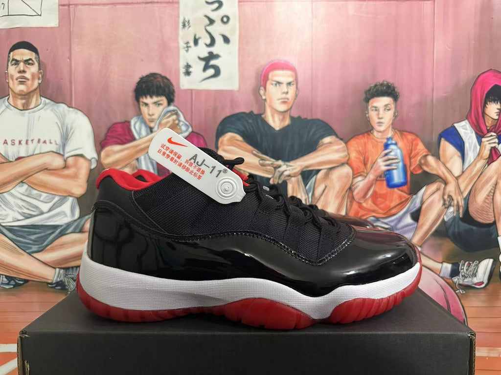Jordan Air Jordan 11 Black and Red Sneakers