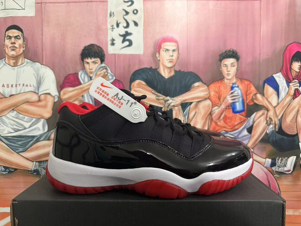 Jordan Air Jordan 11 Black and Red Sneakers