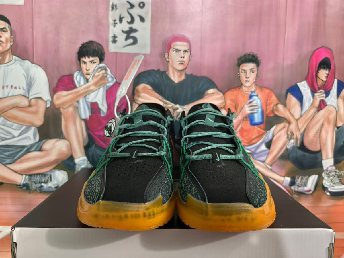 Nike Black and Green Basketball Shoes with Orange Accents