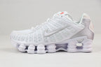 Nike Shox TL Sneakers in Black and Gold