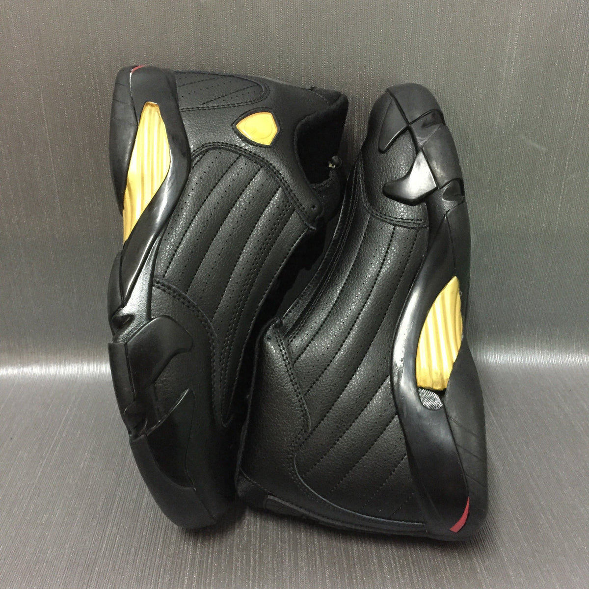 Jordan Air Jordan 14 Black and Gold High-Top Sneakers