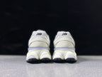 New Balance 9060ZGF Sneakers in White and Grey