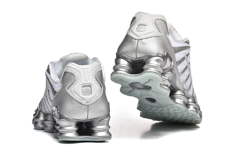 Nike Shox TL Sneakers in White and Metallic Silver