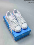adidas Stan Smith White and Pink Low-Top Sneakers