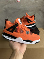 Jordan Air Jordan 4 Orange and Black Sneakers