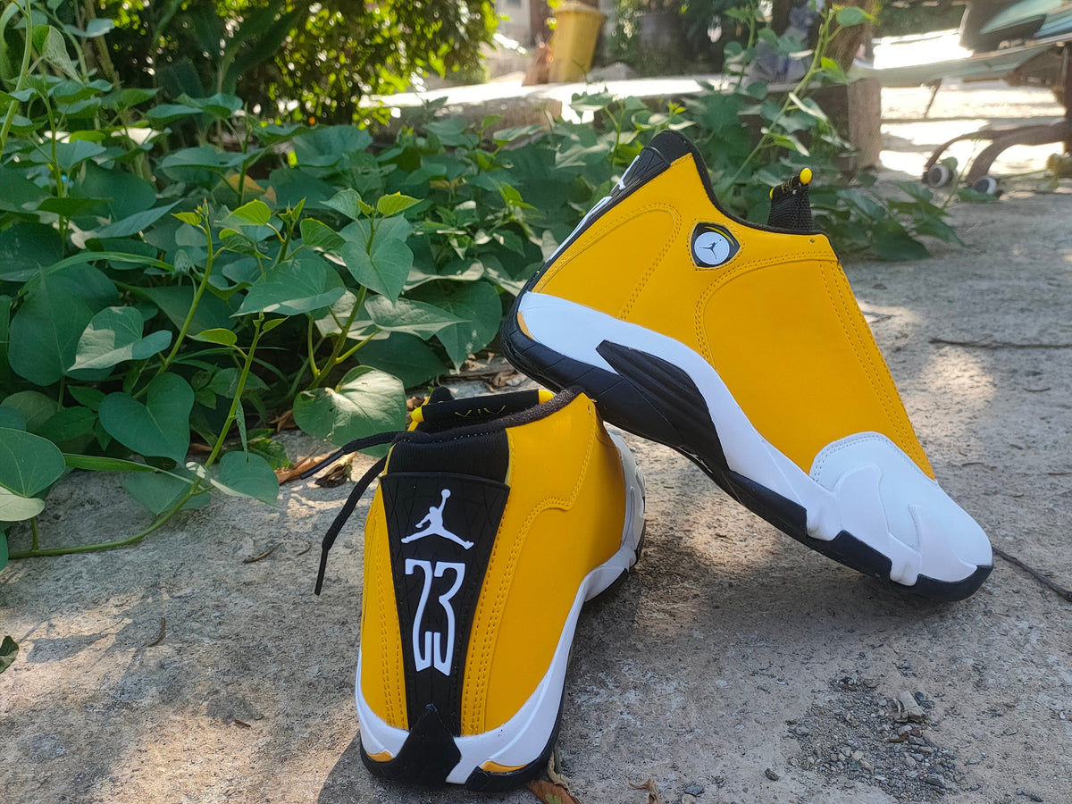 Jordan Air Jordan 14 Yellow and White High-Top Sneakers