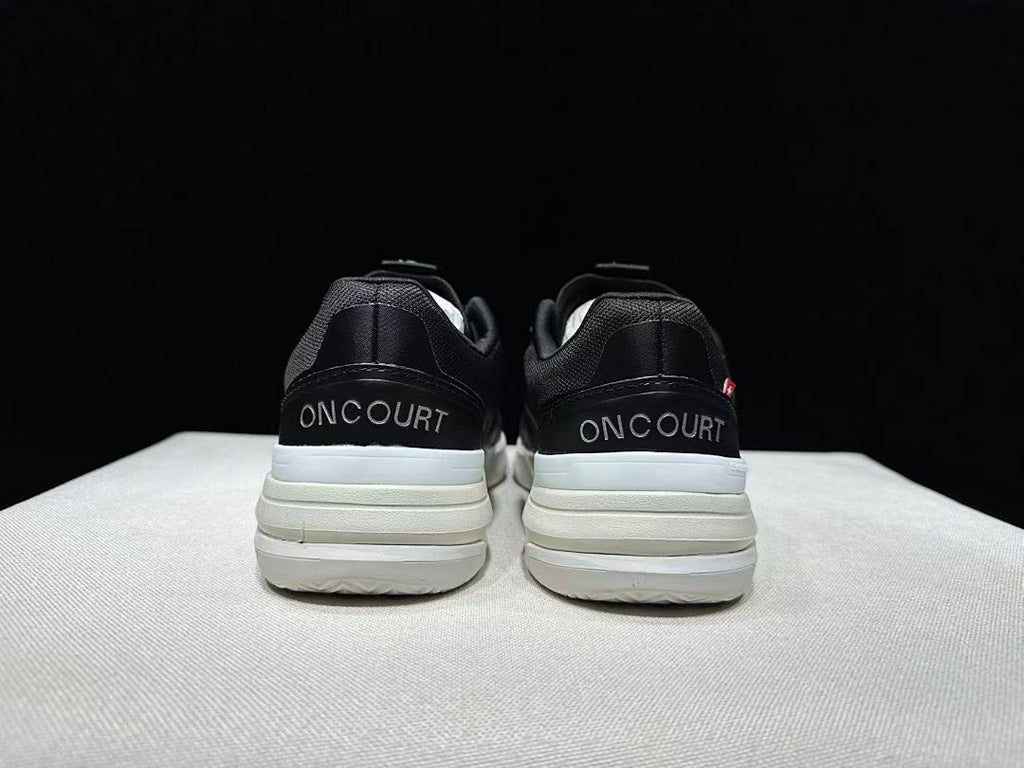 On THE ROGER Clubhouse Pro Tennis Sneakers Black and White