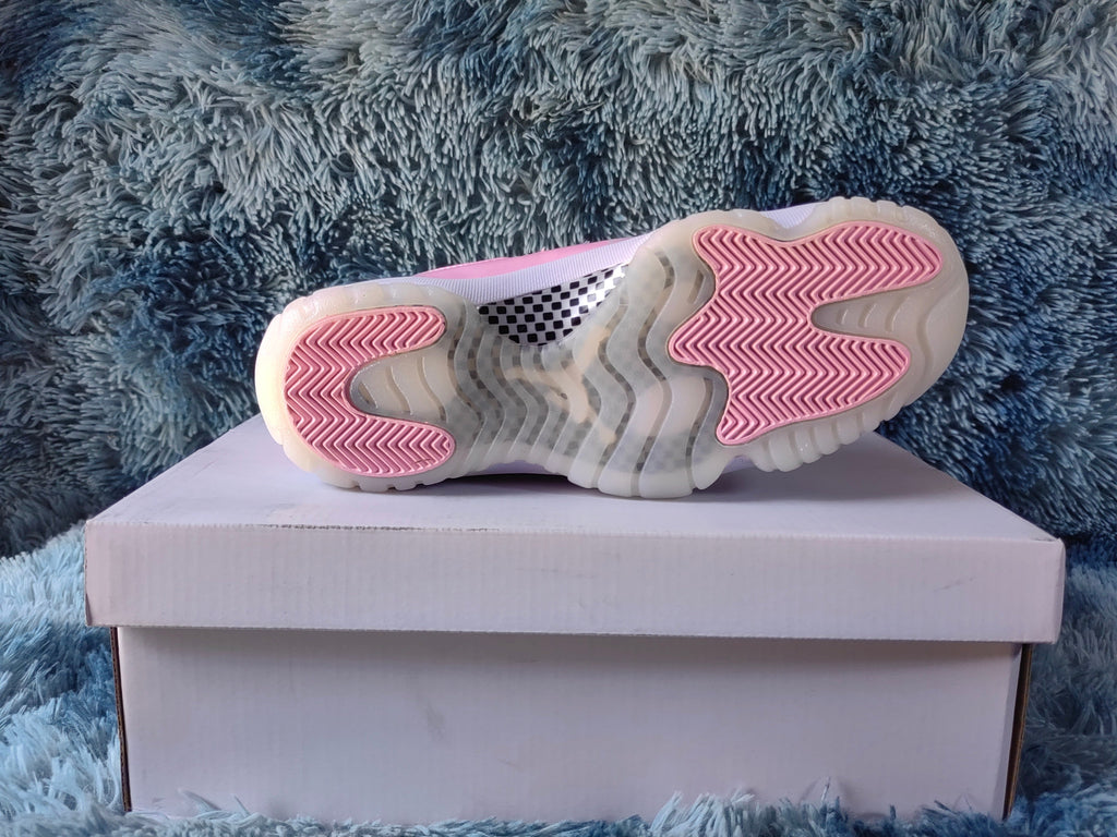 Jordan 11 Retro Pink and White High-Top Sneakers