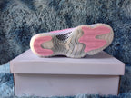 Jordan 11 Retro Pink and White High-Top Sneakers
