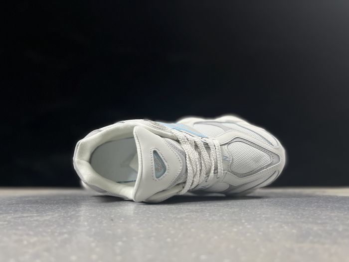 New Balance U9060ZGA Sneakers in White and Light Blue