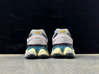 New Balance U9060SRA Sneakers in Grey and Yellow