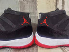Jordan 11 Black and Red High-Top Sneakers