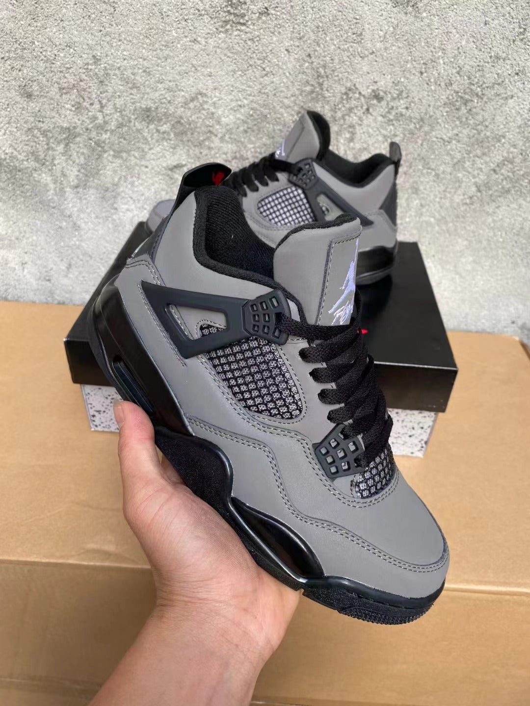 Jordan 4 Grey and Black Sneakers