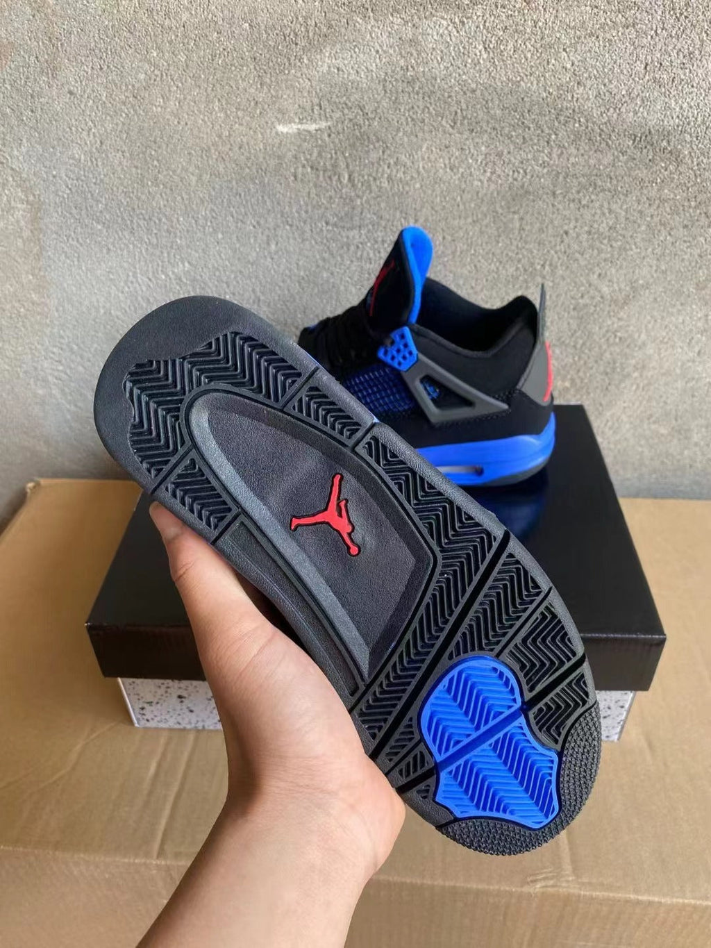 Air Jordan 4 Black and Blue High-Top Sneakers