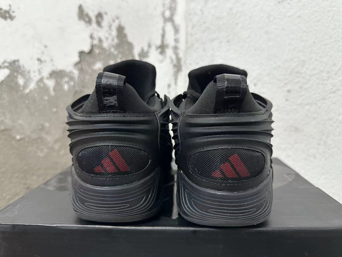 Adidas Black Sneakers with Sculpted Side Panels