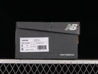 New Balance 9060 WRB Sneakers in Mint and Pink