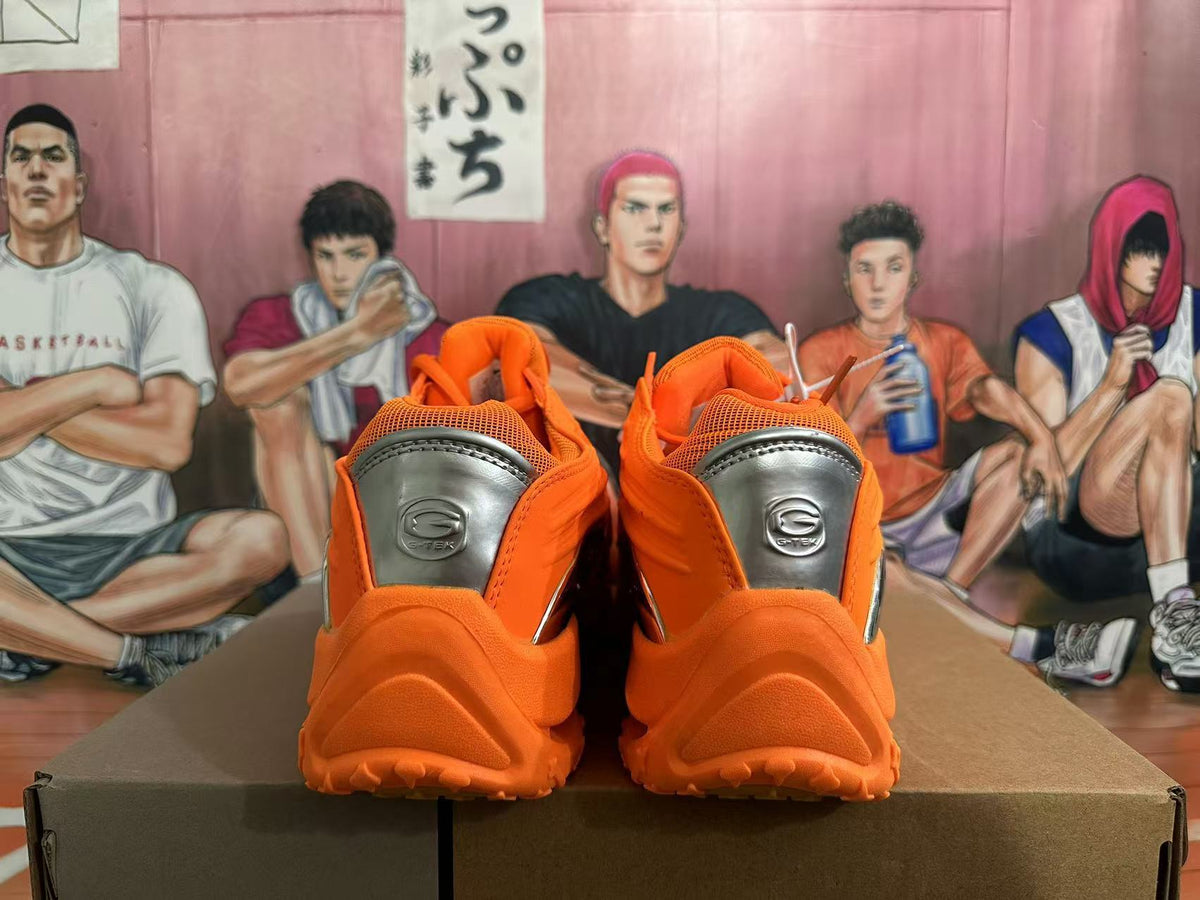 Orange Low-Top Sneakers with Metallic Side Panels