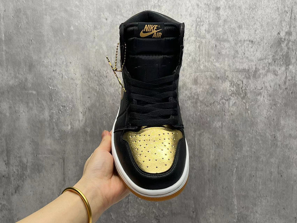 Jordan 1 High Black and Gold Sneakers