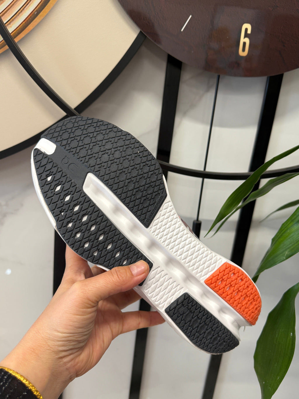 On Cloudsurfer Running Shoes in Rust and White