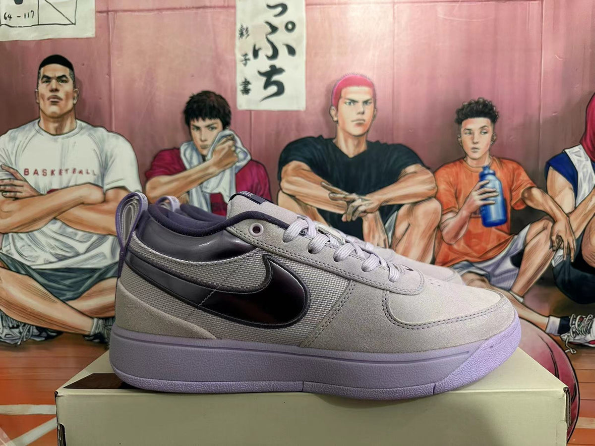 Nike Dunk Low Sneakers in Gray and Purple