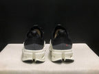 On Cloudsurfer Max Black and White Running Sneakers