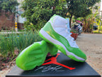 Jordan 11 White and Apple Green High-Top Sneakers