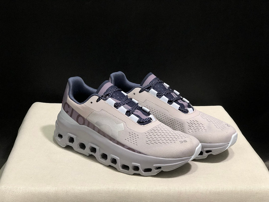 On Cloudmonster Sneakers in Gray and Purple